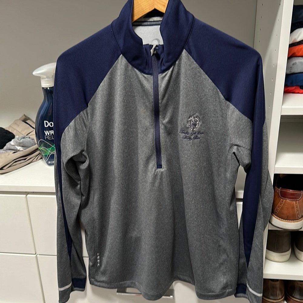 Golf zip up, zero restriction brand